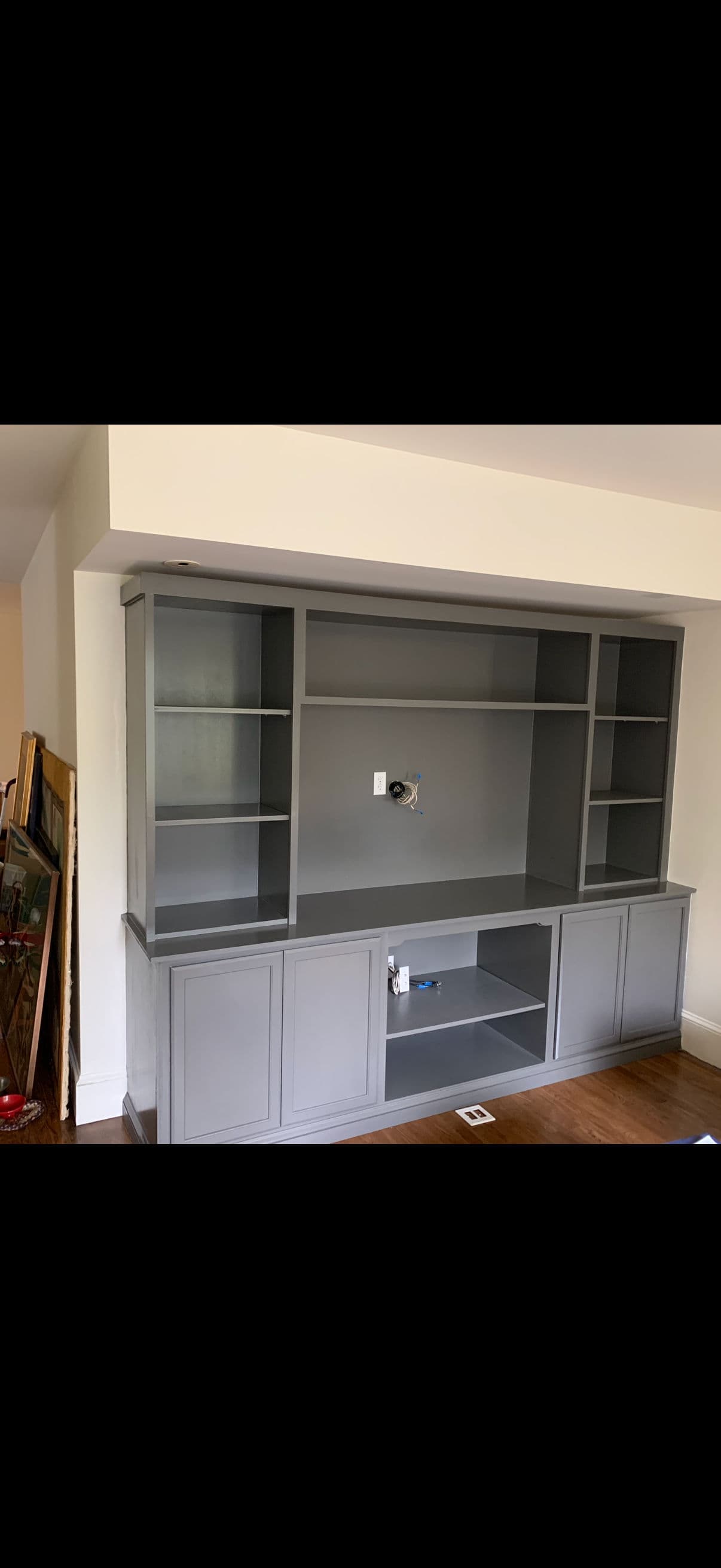 Gallery photos for Blank Living Room Wall Gets a Custom Built-In Entertainment Center: Image #2