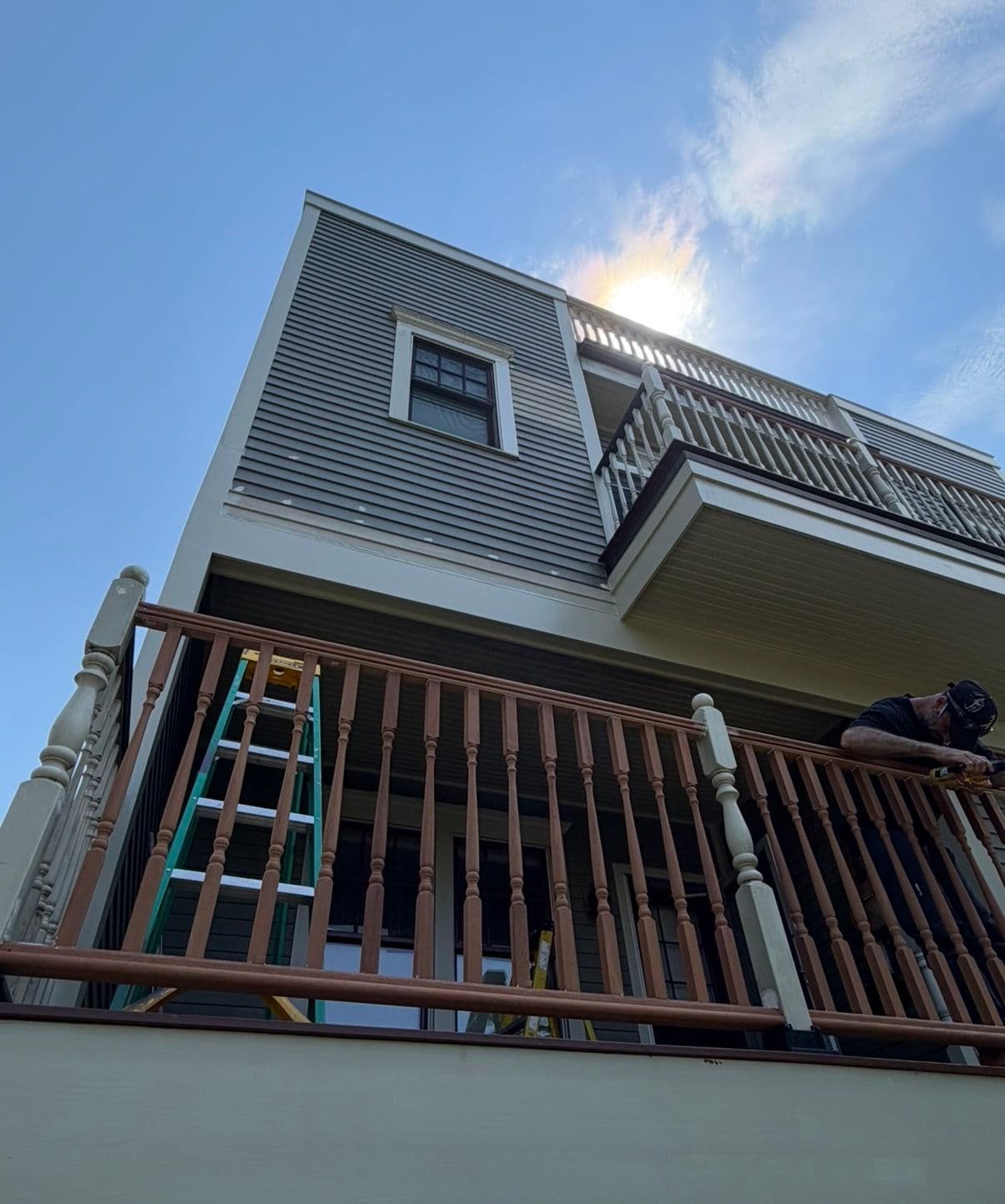 Gallery photos for Mahogany Railing Replacement With a Clean Painted Finish: Image #1