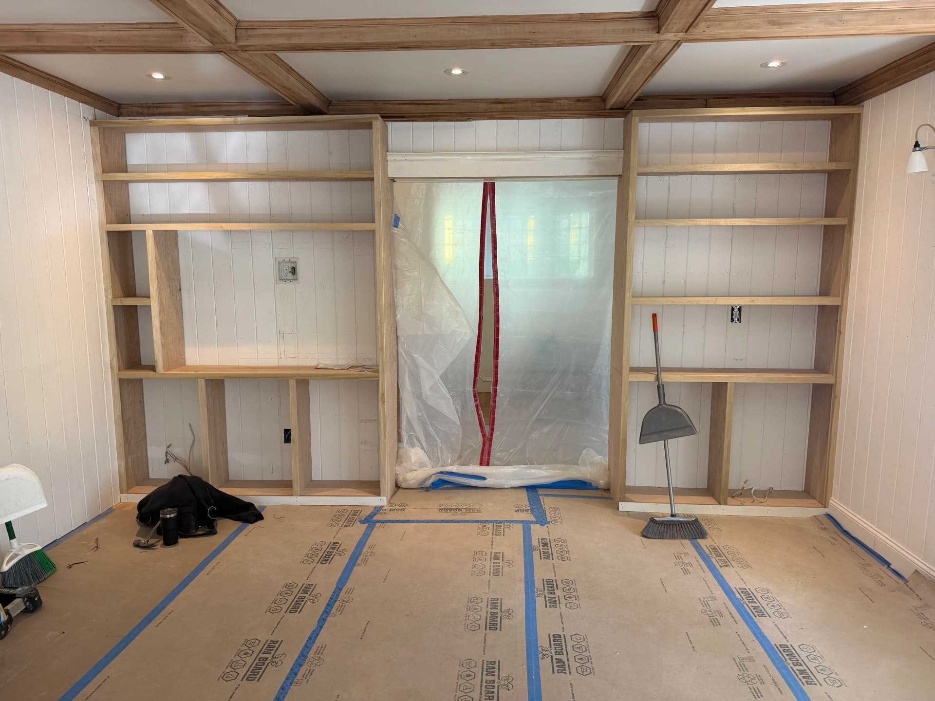 Custom Built-In Entertainment Wall Taking Shape image
